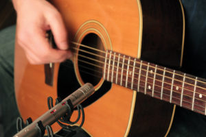 acoustic guitar with microphone