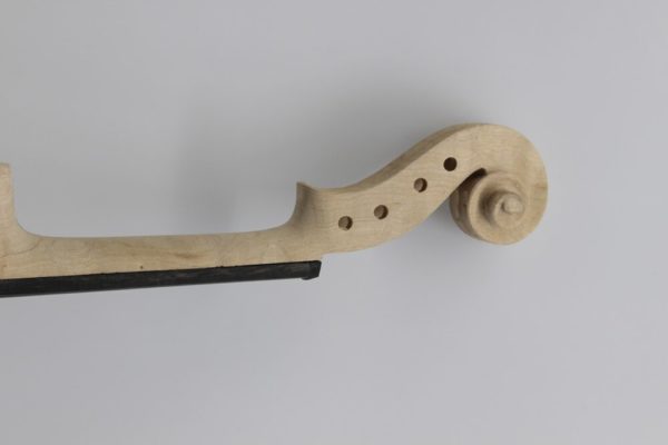 unfinished violin with fittings