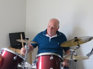 neil playing the drums