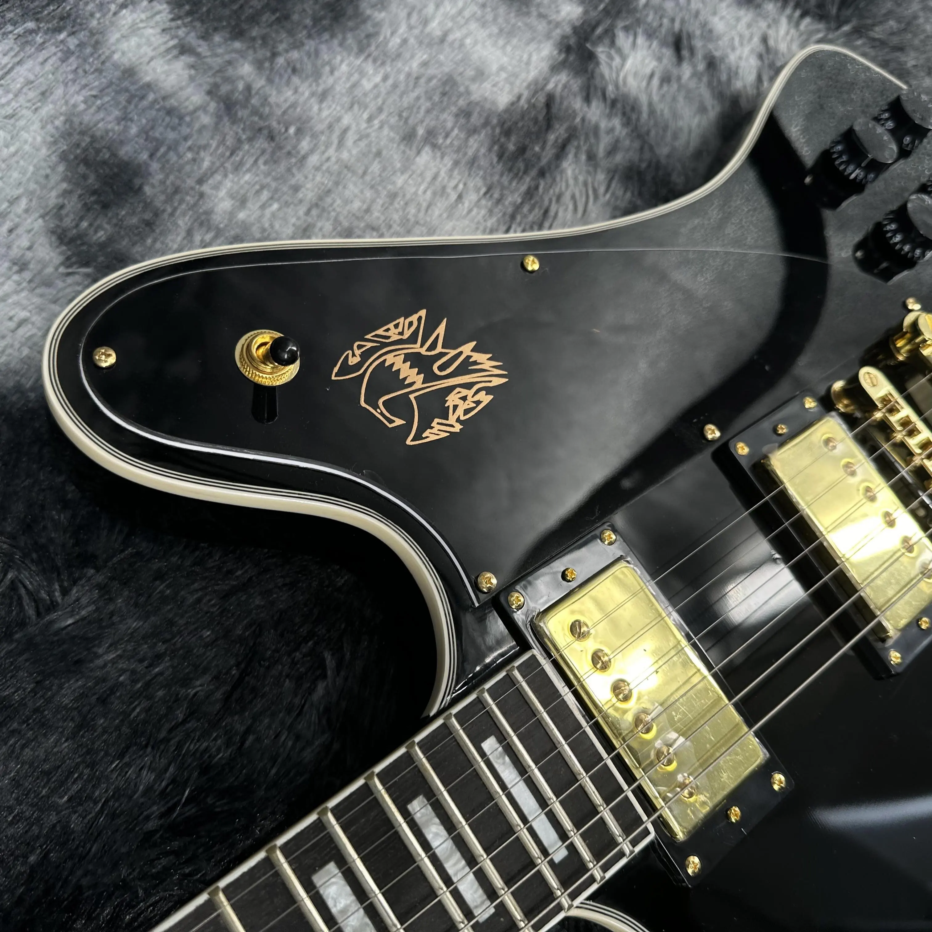 Firebird Black Electric Guitar with Electric Gold Accessories