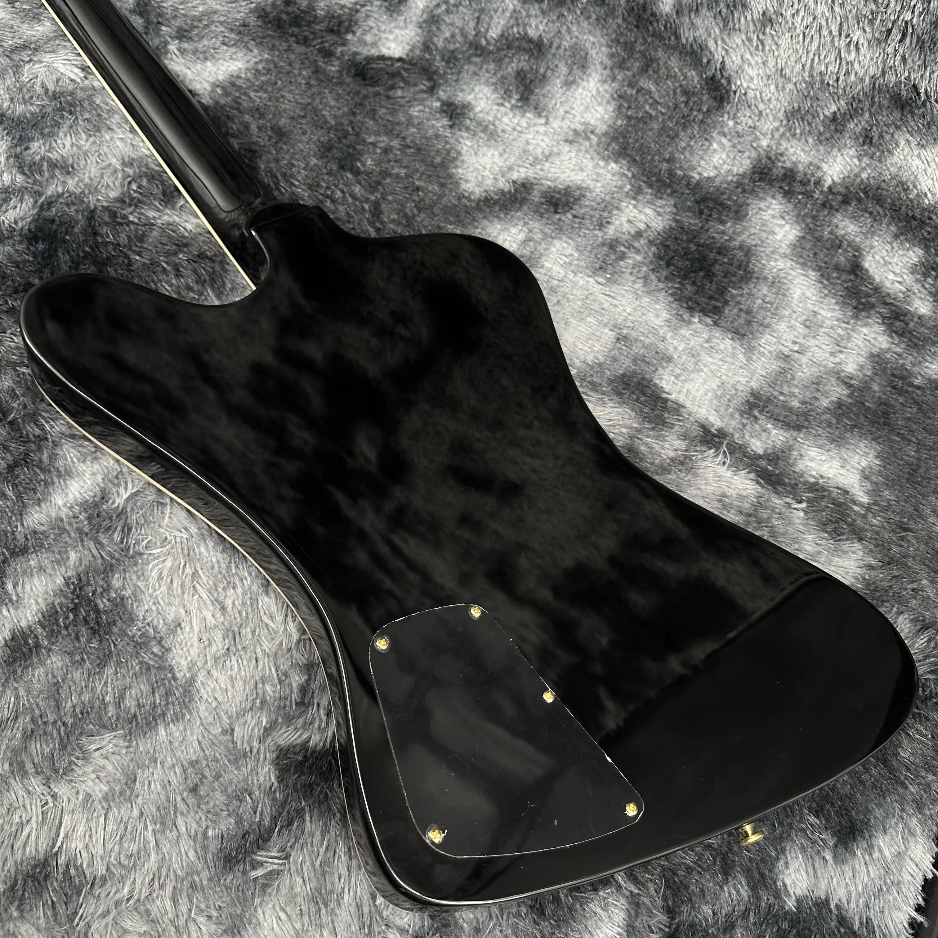 Firebird Black Electric Guitar with Electric Gold Accessories