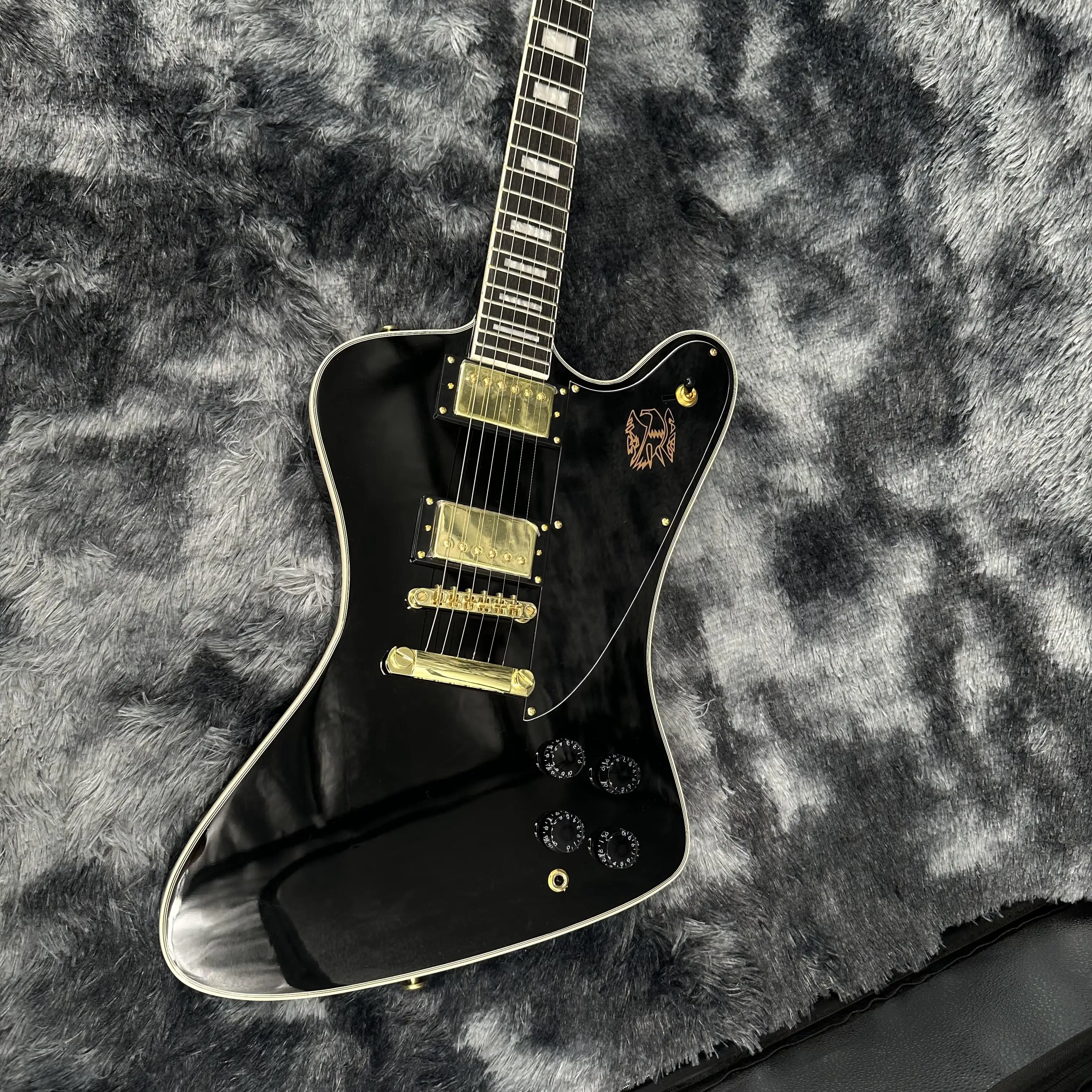 Firebird Black Electric Guitar with Electric Gold Accessories